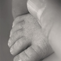Buy canvas prints of Baby foot in hand by Jonathan Pankhurst