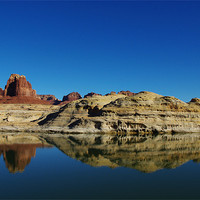 Buy canvas prints of Red and white rock reflection in Colorado River by Claudio Del Luongo
