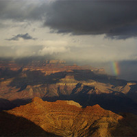 Buy canvas prints of Rainbow, storm cloud and sun on Grand Canyon, Ariz by Claudio Del Luongo