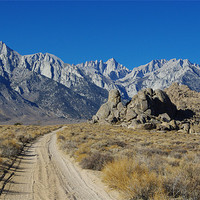 Buy canvas prints of Sand road to Sierra Nevada, California by Claudio Del Luongo