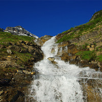 Buy canvas prints of Waterfall near Logan Pass, Montana by Claudio Del Luongo