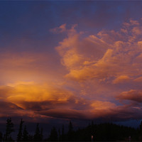 Buy canvas prints of Colourful evening clouds, Rocky Mountains, Colorad by Claudio Del Luongo