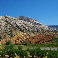 Buy canvas prints of Multicolored river valley, Wyoming by Claudio Del Luongo