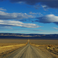 Buy canvas prints of Dirt road through Nevada by Claudio Del Luongo