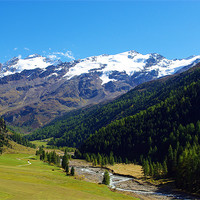 Buy canvas prints of Alpine valley with high Weisskugel near Melag, Ita by Claudio Del Luongo