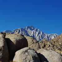 Buy canvas prints of Rocks and highest Sierra Nevada peaks, California by Claudio Del Luongo