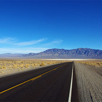 Buy canvas prints of Highway through the desert, Nevada by Claudio Del Luongo