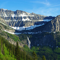 Buy canvas prints of High mountains and waterfall near Logan Pass, Mont by Claudio Del Luongo