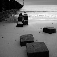 Buy canvas prints of Sea Defences on Cromer Beach by Sophie Martin-Castex