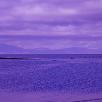 Buy canvas prints of Arran Over the Sea by Chris Archer
