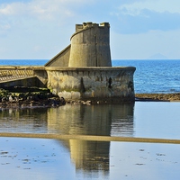 Buy canvas prints of Reflective Ardrossan Watch Tower by Chris Archer