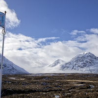 Buy canvas prints of  Glencoe & the Scottish flag by yvonne & paul carroll