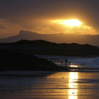 Buy canvas prints of  Moody sunset over Eigg by yvonne & paul carroll
