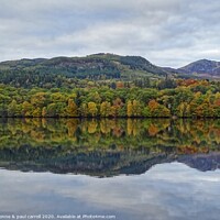 Buy canvas prints of Autumn reflections on Faskally Loch, Pitlochry by yvonne & paul carroll