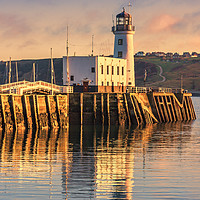 Buy canvas prints of Sunset over Scarborough Lighthouse by Susan Leonard