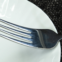 Buy canvas prints of Fork on a plate by David Pacey