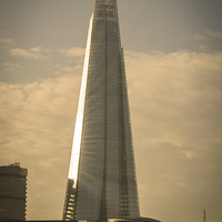 Buy canvas prints of  Shard reflecting the sun by Phil Robinson