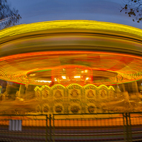 Buy canvas prints of  Roundabout at a fairground in London  by Phil Robinson