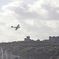Buy canvas prints of  Lancaster Bomber and a Spitfire flying over Dover by Phil Robinson