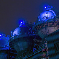 Buy canvas prints of Three storage tanks at the landshaft Park, Germany by Phil Robinson