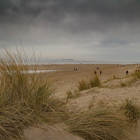 Buy canvas prints of Moody day at Bamburgh beach, Northumberland by Heather Athey