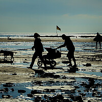 Buy canvas prints of Family at the Sea side  by Dave Bell
