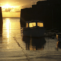 Buy canvas prints of Rising Sun at Mousehole Cornwall by Dave Bell