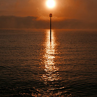 Buy canvas prints of Sunrise Behind Groyne  Marker, by Dave Bell