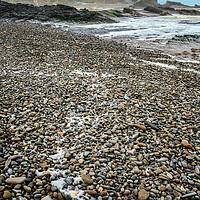 Buy canvas prints of Wet pebble beach by Dave Bell