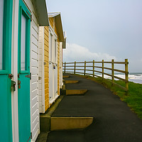 Buy canvas prints of Beach Huts, Colored Chalets by Dave Bell