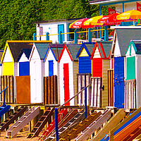 Buy canvas prints of Bright Beach huts by Dave Bell