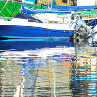 Buy canvas prints of Stunning reflections of blue and green boats in th by Dave Bell