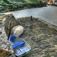Buy canvas prints of Dinghy's Parked on sea wall by Dave Bell