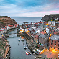 Buy canvas prints of Sunrise over Staithes, on the North Yorkshire Coast by Martin Williams