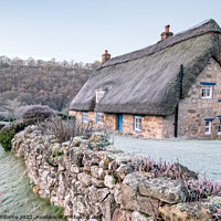 Buy canvas prints of Frosty thatched cottage at Rievaulx village, North Yorkshire by Martin Williams