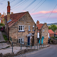 Buy canvas prints of Sunset over Robin Hoods Bay, New Road, North Yorkshire by Martin Williams