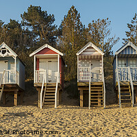 Buy canvas prints of Panoramic of the Beach huts at Wells Next the Sea, Norfolk by Martin Williams