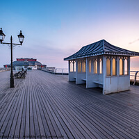 Buy canvas prints of Sunrise at Cromer pier by Martin Williams