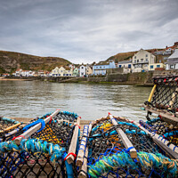 Buy canvas prints of Lobster pots at Staithes, North Yorkshire by Martin Williams
