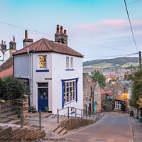 Buy canvas prints of Sunset over Robin Hoods Bay, New Road, North Yorkshire by Martin Williams