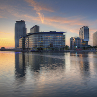 Buy canvas prints of Sunset at Salford Quays Media City by Martin Williams