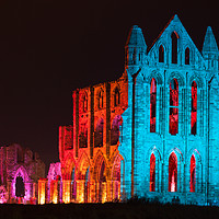 Buy canvas prints of Illuminated Whitby Abbey by Martin Williams