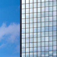 Buy canvas prints of Office block reflective windows by Martin Williams