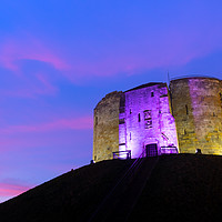 Buy canvas prints of Sunset over Cliffords Tower, York by Martin Williams