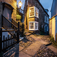 Buy canvas prints of Peacock Row in Robin Hoods Bay by Martin Williams