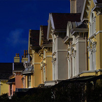 Buy canvas prints of Colourful house façades. by mike fahy