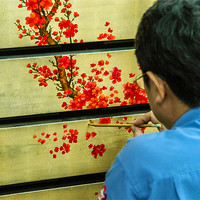 Buy canvas prints of Vietnamese Lacquer Painter by Mark Llewellyn