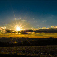 Buy canvas prints of Combe Sunset by Mark Llewellyn
