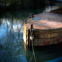 Buy canvas prints of Rusty Barge by Mark Llewellyn