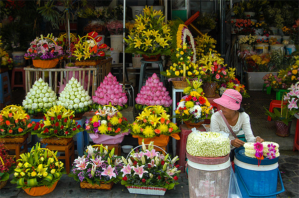 Cambodian Flower Seller Picture Board by Mark Llewellyn